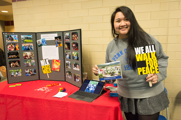 Tia G. La, a pre-physician assistant student from Guam, promotes her club, Minorities Lending Knowledge, at the Student Involvement Fair.