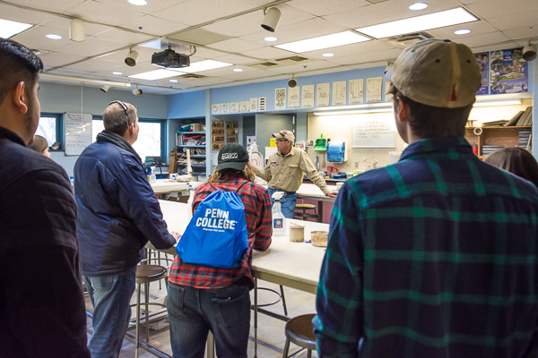 Dave A. Stabley, instructor of ceramics and wood sculpture, talks to prospective students about the awesome art electives and art majors on campus, including courses in ceramics.