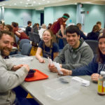 Penn College students Michael J. Schaffer (left), of Cogan Station, and Matthew M. Hober, of Basking Ridge, N.J. – residential construction technology and management: building construction technology concentration majors – join Bloomsburg University's Kyrsten Baker and Katie Benner, of Williamsport.