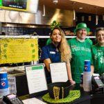 Festively outfitted and wishing "life's many blessings" to all are (from left) Jessica L. Cavanaugh, of Lewistown, a health information management major and substitute dining services worker; and dining services workers Wanda A. Gardner and Janet L. McDermott.