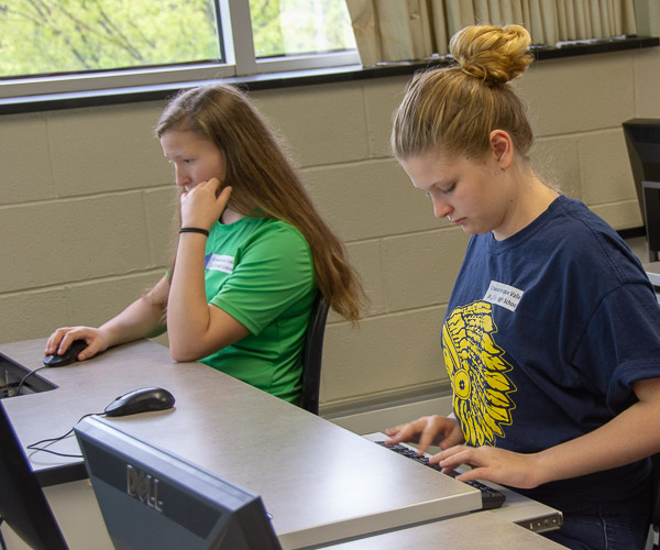Students learn about the importance of medical coding in a session led by Michele M. Budnovitch, instructor of business administration/health information technology.