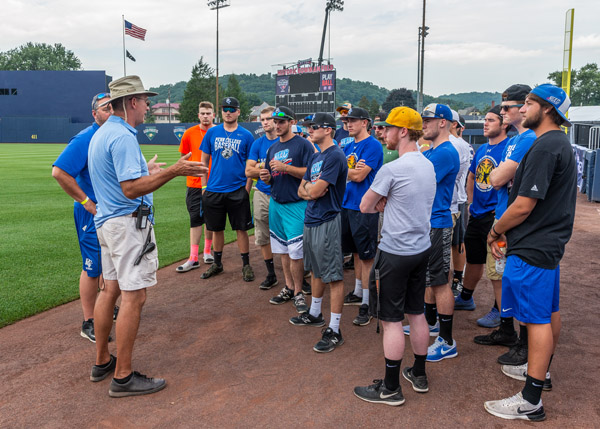 Cook preps his winning lineup of helping hands Thursday afternoon.