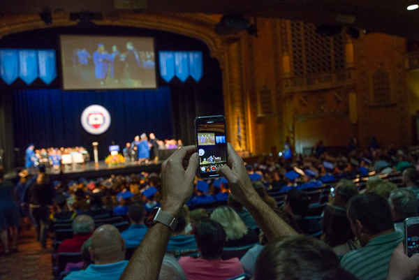 A cellphone video captures that momentous walk across the stage.