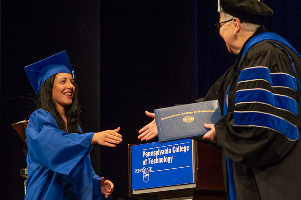 A triumphant moment for the day's graduates, including surgical technology major Torri M. Johnson, of Smethport