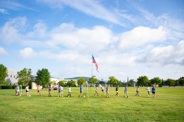 While moving bins were wheeled across campus, soccer balls rolled on the Madigan Library lawn as the women’s team practiced Saturday morning (and the men’s squad did likewise in the afternoon). Many student-athletes also lent their feet (and hands) to the move-in effort.