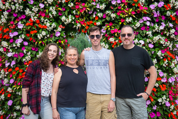 A floral frame offers a beautiful backdrop for Jason T. Francis and family. Francis is a pre-physician assistant studies student from Pottstown.