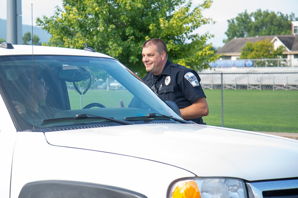 Equipped with a smile and directional advice, Penn College Police Officer Jeffrey E. Kriner offers assistance along the way.