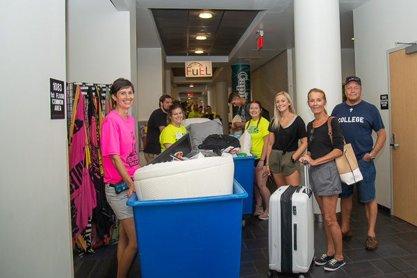 The Funk family from Bellefonte (right) receives an assist from women’s volleyball coach Bambi A. Hawkins (in pink). Sara M. Funk (third from right) is a pre-physician assistant studies major. Hawkins is also the learning laboratory coordinator for the emergency medical services/paramedic program.