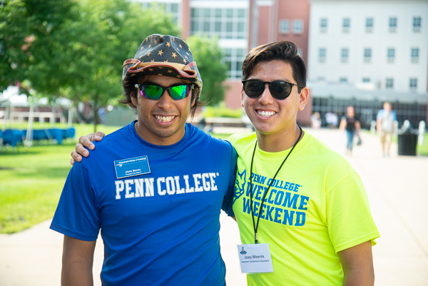 “It didn’t feel right not coming back,” said alumnus and former RA Christopher J. Morrin (left) who was happy to return to campus to help with move-in and visit his brother Joseph M., a graphic design student. The elder Morrin, a three-time Penn College degree holder, is enjoying a satisfying career in building automation with CM3 Building Solutions, based in Fort Washington. The brothers hail from Morrisville.