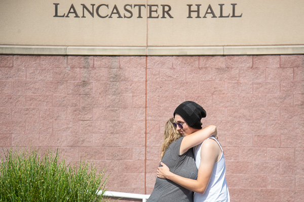 … and hug from son Troy V. Patcyk, an information technology: network specialist concentration student from Julian.