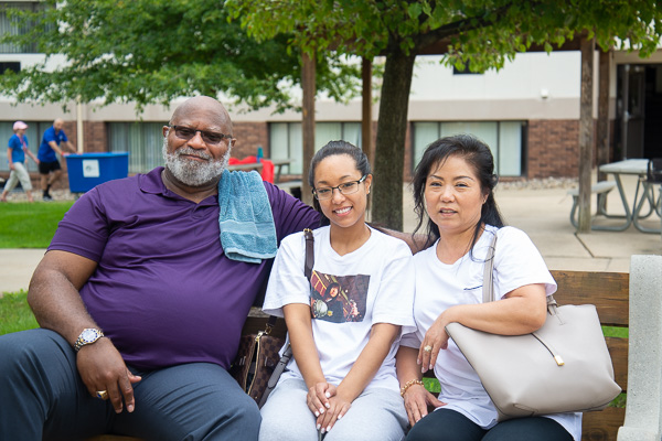 From Spotsylvania to Pennsylvania, Virginia resident Alisha K. Ayers and parents enjoy some much-deserved rest on a campus bench following their long drive and moving logistics. Ayers is a transfer student majoring in dental hygiene.