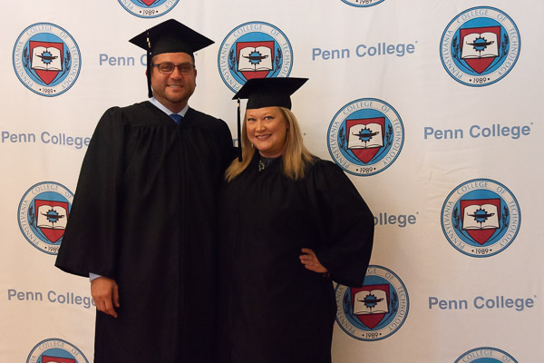 The college's step-and-repeat banners are a popular backdrop ...