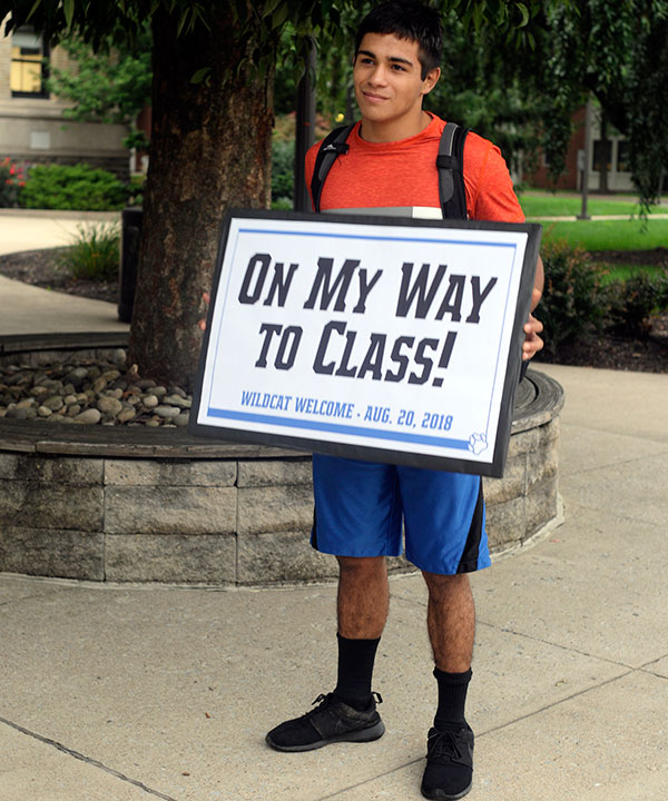 Oscar Zamarippa Garcia, of Montgomery, a business management major, poses for a start-up photo outside the Klump Academic Center.
