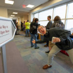Simon P. Couls Jr., information assurance and cyber security, exhibits excitement (and refreshment) in the line.