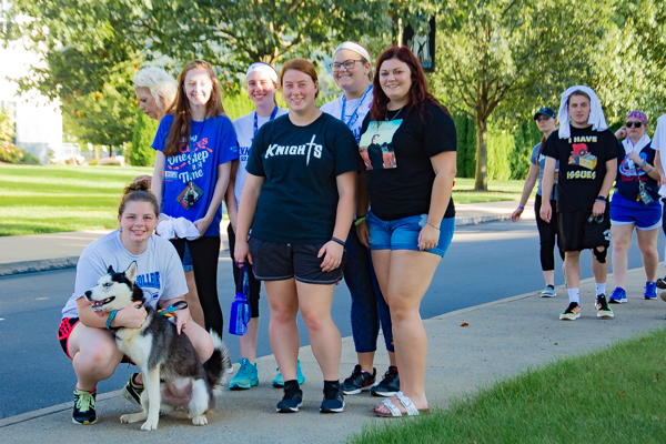 Whether two- or four-legged, walkers aid the fight against despair.