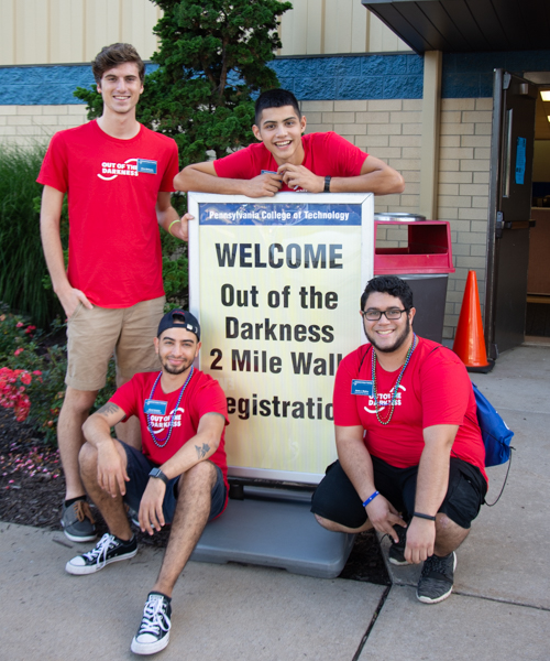 Clockwise from front left, Community Peer Educators David A. Gadalla, Ethan M. McKenzie, Samuel J. Pham and Alexis J. Medero help with promotion and support.