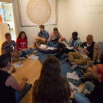 High school visitors settle into a quiet meditation corner in The Gallery at Penn College to participate in Meredith Grimsley’s workshop focused on healing through vulnerability, empathy and stitch.