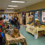 Adipocere Soap, specializing in vegan products that go beyond its name, is represented by Madigan Library's April N. Line (left).