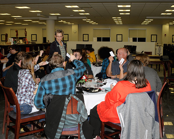 A CTL season pass awaits one lucky winner as director Martena Rogers collects ballots from the amateur sleuths in attendance.