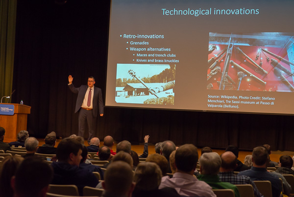 Striking a chord through students' familiarity with a battlefield-themed video game, Deak discusses soldiers' use of improvised weaponry – maces, grenades, brass knuckles and crude armor, among them.