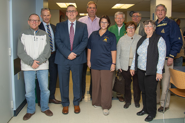 At the post-talk gathering in Wrapture, Deak and Marty pose with members of the Notre Dame Club of Greater Williamsport.
