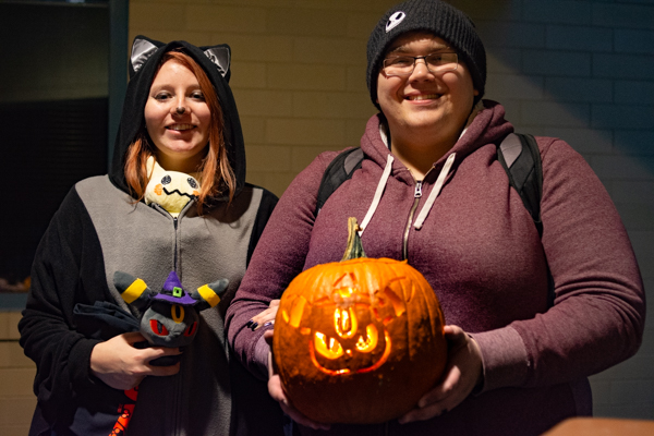 Catherine E. Weatherman, an engineering design technology major from Ringtown, and Tylor S. Eltz, of Spring Grove, enrolled in information technology sciences-gaming and simulation, display their handiwork.
