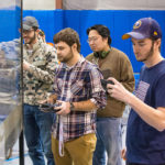 A steady hand on the controller ... and in capturing the contest on cellphone video.