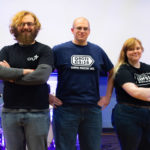 Representing three of the evening's five sponsoring organizations are (from left) Cru's Dillon W. Wertman, of Auburn; CMI's Tyler C. Geer, of Wellsboro; and UCM's Holly J. Wilson, of Lock Haven.