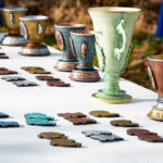 Penn College-crafted ceramic trophies and ornaments await the winners.