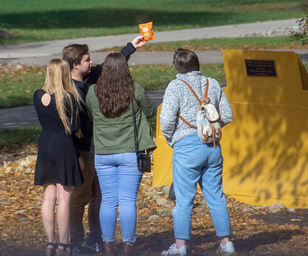 During a session on digital marketing and social media, students are given a product – a bagged snack – and tasked with creating a catchy Instagram post to promote it.