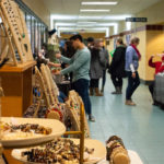 Jewelry by Ellen Montis graces the market entrance outside CC Commons.