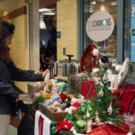 Alexandra "Ali" D. Petrizzi, a graphic design major from Langhorne, searches for the perfect gift (or maybe just a way to beat the chill).