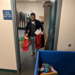 Gadalla, an aviation maintenance technology major from Mechanicsburg, shuttles the colorful bounty to a transport cart ...