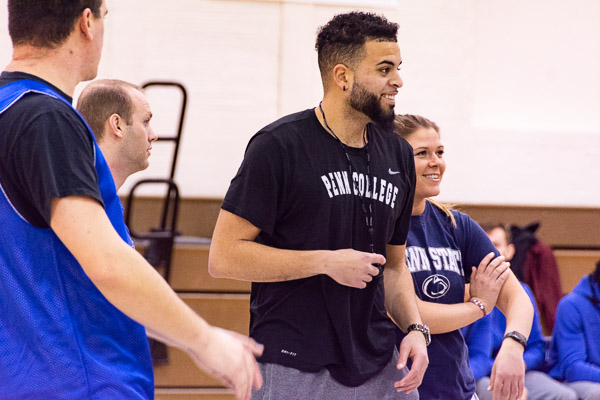Wildcat forward Matthew T. Salvent, a nursing major from East Brunswick, N.J., officiates during the alumni contest.