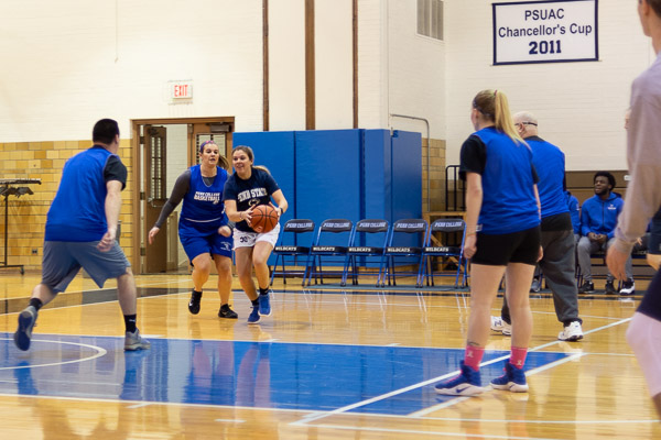 Among the returning players are former Lady Wildcats Jane M. Herman (center left) and Erica L. Logan. Herman, who also played tennis and soccer during her college years, is a 2018 graduate in dental hygiene: health policy and administration concentration. Logan was accompanied by her father, who also attended classes at the institution.<br />