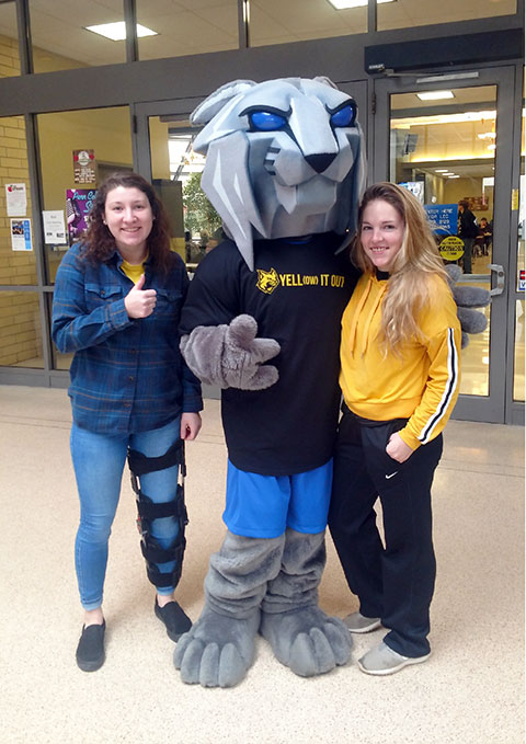 The Wildcat joins students Madison L. Kistler (left), a surveying technology major from Kutztown, and Kayla M. Spotts, of Shamokin, enrolled in business administration: sport and event management concentration.