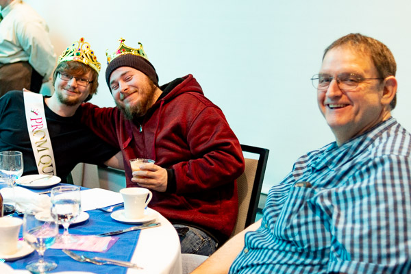 Enjoying their evening (from left) are student Scott W. Master (sporting a