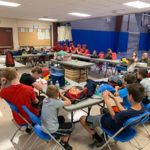 Youngsters grab a seat for a Q&A with the 'cutters. From left are Maldonado, Bennett, Lancaster, Litton and Gomez.