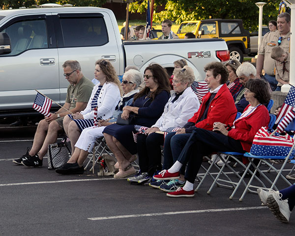 Appreciative DiSalvo representatives (honored with the Largest Family Group trophy, but too humble to accept it) are front and center on a picture-perfect night.