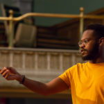 Glass shares his powerful voice with an engaged audience.