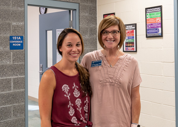 Representing the OTA Club are Carissa N. Rutledge (left), an occupational therapy assistant major from Williamsport, and Elizabeth A. Dixon, the program's clinical director.