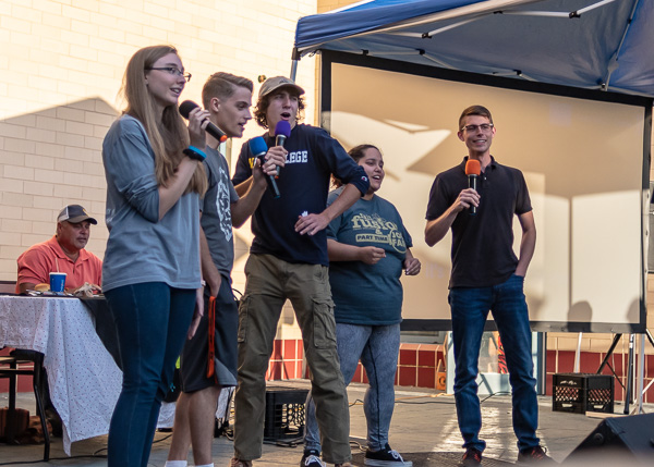 It's gonna take a lot to drag us away from this all-star lineup, fronted by Student Government Association President Patrick C. Ferguson (center), singing Toto's
