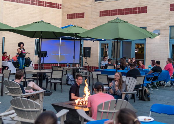 The fire pit on the Campus Center Patio adds a warm glow to the occasion.