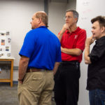 On hand to assist guests are (from left) welding instructor Timothy S. Turnbach; Thomas E. Ask, professor of industrial design; and Jeremiah C. Johnson, makerspace attendant.