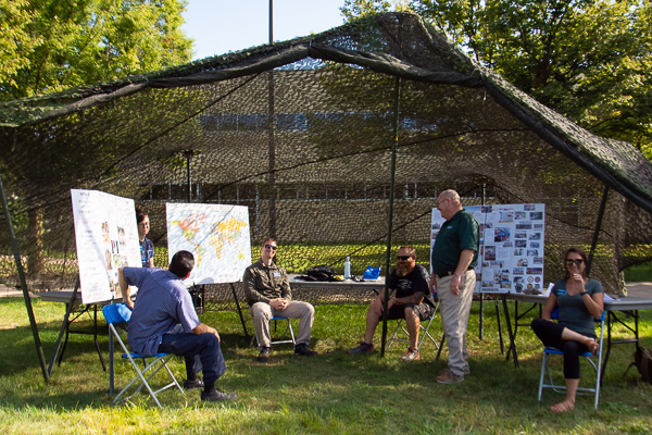 As always, Chet Beaver (standing), coordinator of veteran and military services, and crew are ready to help where needed.