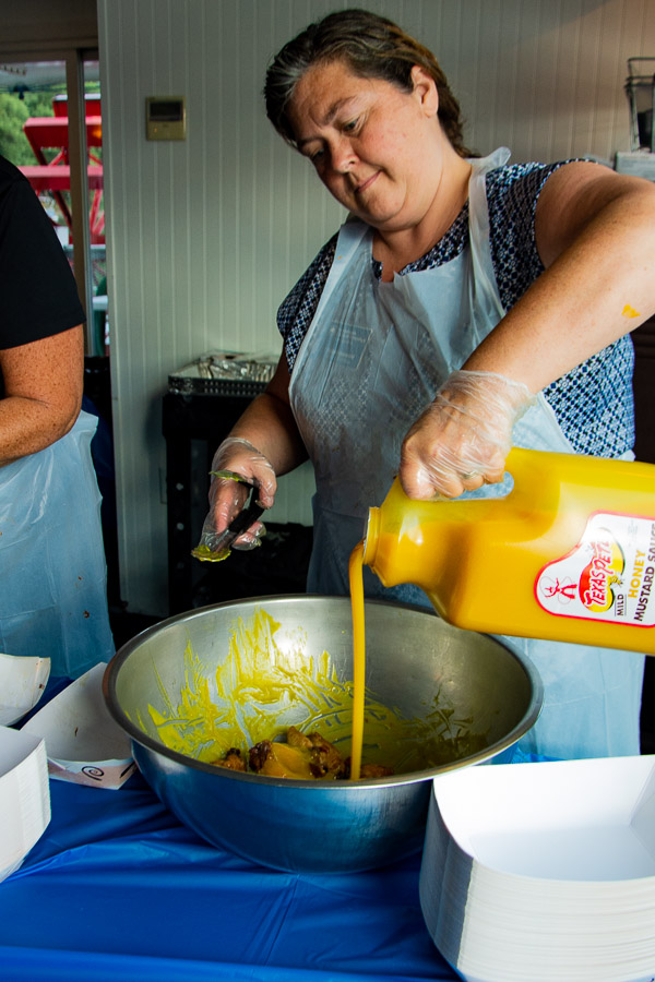 Cheryl Y. Hammond, Dining Services' special events manager, concocts one of the night's special sauces.