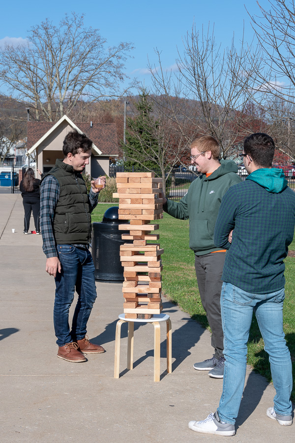 Contemplating the right move in giant Jenga