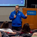 Randy J. Zangara, dean of college transitions and first year initiatives, welcomes educators in the Student & Administrative Services Center.