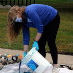 WEB's Flanagan, a business administration: management concentration student, starts the dye flowing ...