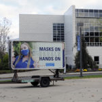 Presidential student ambassador Gabrielle R. Fries, a physician assistant studies major from Williamsport, adorns one side of the mobile billboard ...